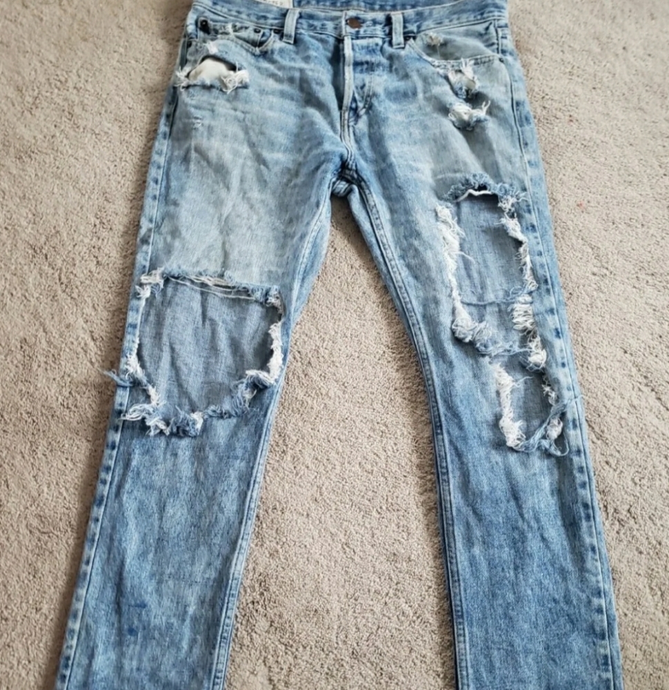 Hollister distressed skinny jeans Stone wash in color button fly Size tag 32x32